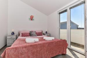 Voodi või voodid majutusasutuse Apartments Krepo toas