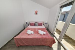Voodi või voodid majutusasutuse Apartments Krepo toas