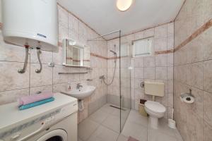 Vannituba majutusasutuses Apartments Krepo
