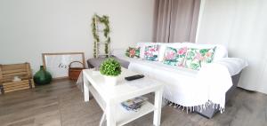 เตียงในห้องที่ Appartement Ajaccio vue mer panoramique