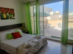 Voodi või voodid majutusasutuse D'Ambrogio Guest House toas