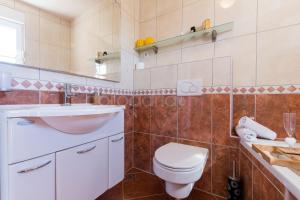 Kúpeľňa v ubytovaní Seaview apartments Duky + 25 fotografií