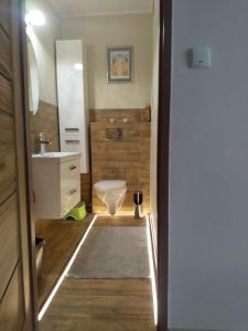 Kúpeľňa v ubytovaní Apartament Blisko Plaży