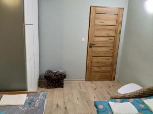 Posteľ alebo postele v izbe v ubytovaní Apartament Blisko Plaży