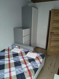 Posteľ alebo postele v izbe v ubytovaní Apartament Blisko Plaży