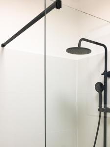 a glass door with a lamp on it at Land and Sea in Primošten +33 photos