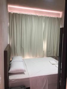 Afbeelding uit fotogalerij van Canastra Flat Hospedagem in Vargem Bonita +12 foto's