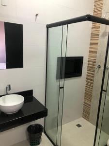 Phòng tắm tại Canastra Flat Hospedagem