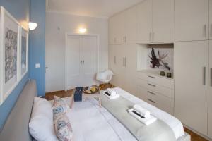 Llit o llits en una habitació de Syntagma Apartments with Acropolis view