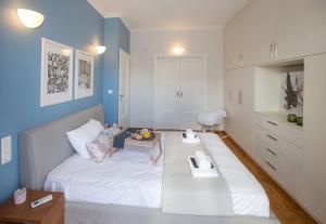 Llit o llits en una habitació de Syntagma Apartments with Acropolis view