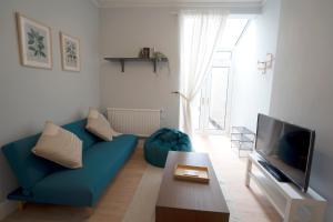 O zonă de relaxare la Beautiful Family Home in the Heart of Swansea