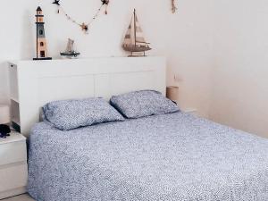 Postel nebo postele na pokoji v ubytování CASA MIRAMAR