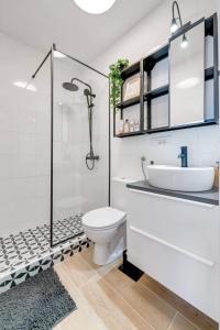a bathroom with a shower and a toilet and a sink at Port in Rijeka +19 photos
