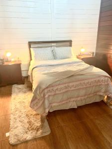 En eller flere senge i et værelse på Casa centro Capivari 700m distância