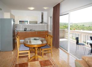 Kuchyň nebo kuchyňský kout v ubytování Apartments Vlade