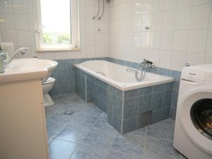 Koupelna v ubytování Apartments Vlade + 27 fotografií