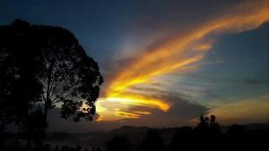 a cloud formation in the sky at sunset at RIVERSIDE PALM INN SG LEMBING in Sungai Lembing