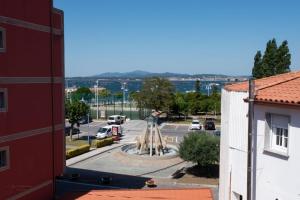 a view of a fountain in a parking lot at Casa Viturna in O Grove