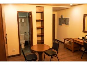 TV a/nebo společenská místnost v ubytování M28 Hotel and Apartments