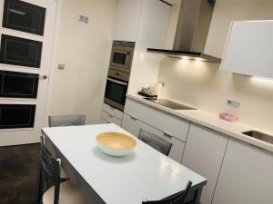 A kitchen or kitchenette at A Misericordia Viveiro