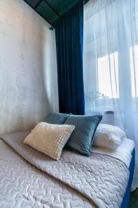 Postel nebo postele na pokoji v ubytování Apartments24 Ilu