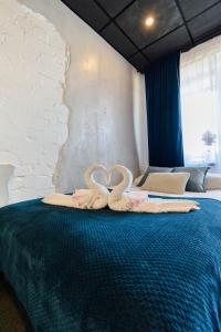 Postel nebo postele na pokoji v ubytování Apartments24 Ilu