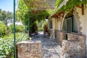 Vonkajšia záhrada v ubytovaní Villa Georgina B&B