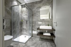 A bathroom at Villa Fauster Pustrabase