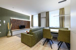 A television and/or entertainment centre at Villa Fauster Pustrabase
