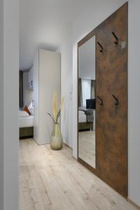 A bed or beds in a room at Villa Fauster Pustrabase