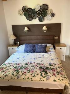 A bed or beds in a room at Rózsa Apartman Zalakaros