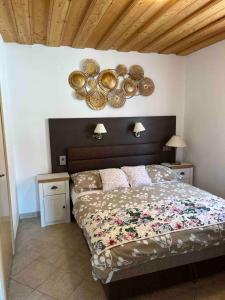 A bed or beds in a room at Rózsa Apartman Zalakaros