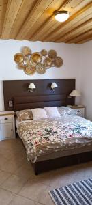 A bed or beds in a room at Rózsa Apartman Zalakaros