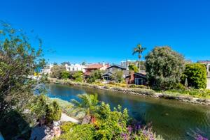 a view of a river with houses and trees at Villa 3 bedrooms on Venice Beach Canal. in Los Angeles