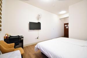 TV a/nebo společenská místnost v ubytování Serenity Moutainview Homestay
