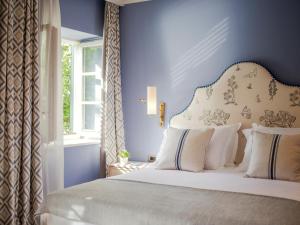 Кровать или кровати в номере Hotel Supetar