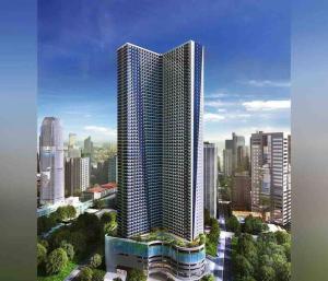 a rendering of a tall building in a city at Netflix all day in Lovely 1BR with Balcony Condo AIR Residences in Manila