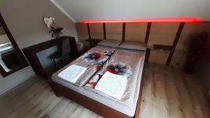 Postel nebo postele na pokoji v ubytování TABÁN Apartman