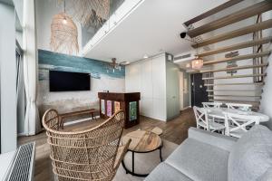 TV tai viihdekeskus majoituspaikassa ApartPark Baltic Home