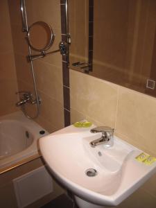 Koupelna v ubytování Winslow Infinity Aparthotel