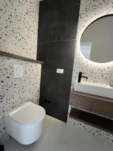 Koupelna v ubytování CUBE Residence