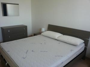Postel nebo postele na pokoji v ubytování Residence Via Del Mare