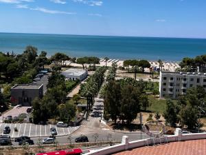 an aerial view of a parking lot next to the ocean at Belix Seaview Apartments in Durrës