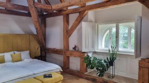 Posteľ alebo postele v izbe v ubytovaní MANOR Boutique Hotel