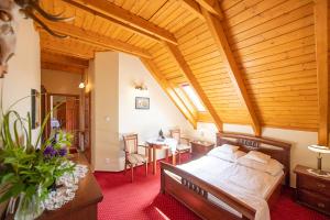 Postel nebo postele na pokoji v ubytování Apartamenty Galeria Trunków