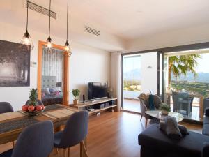 TV a/nebo společenská místnost v ubytování La CALA VIEW 101, GOLF, JACUZZI, SAUNA