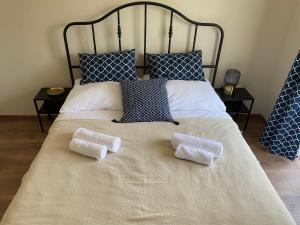 Posteľ alebo postele v izbe v ubytovaní Sziget Apartment