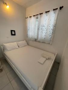 Фотография из галереи Santorini Grace Villa 3 в городе Foinikiá