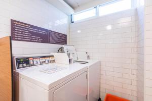 Kuchyň nebo kuchyňský kout v ubytování CU Hotel Taipei