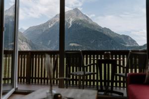 a balcony with a view of a mountain at Apart Peak Ötztal in Längenfeld